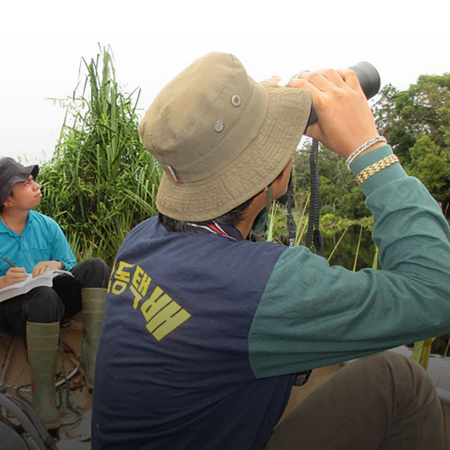 RER Team Members observing migrating birds.